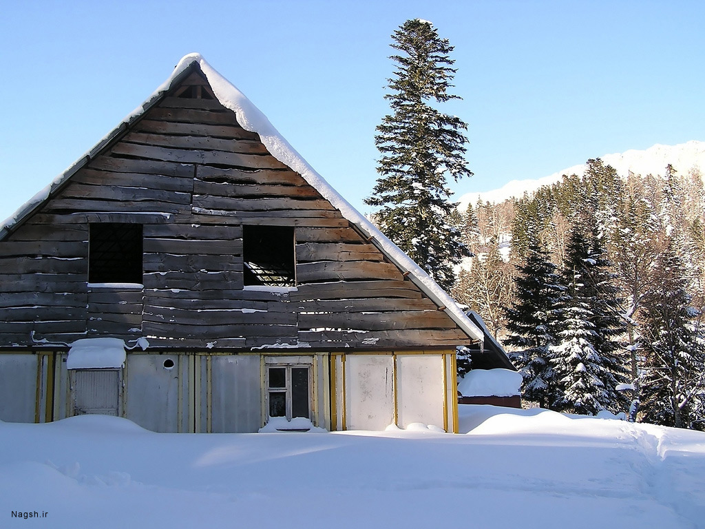 خانه ای پوشیده از برف